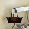 Bolso tipo baguette de lujo de nicho estilo francés, bolso tipo dumpling moderno y a la moda, adecuado para el uso diario, bolso versátil y moderno para hombro y debajo del brazo