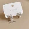 Ear Cuff de Zirconia Mosaico Cuadrado Blanco para Mujer Diseño de Nicho Versátil Moda Simple Pendientes Nuevos Accesorios para Oreja 2026