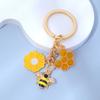 Llavero pequeño de margarita y abeja fresca corazón de niña metal aceite llavero creativo adornos para colgar en bolso regalo para novias