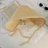 Sombrero de pescador de paja hueca de ala ancha para mujer, diseño de verano fino y transpirable, profundizado y ampliado para hacer que la cara parezca más pequeña, sombrero tipo cubeta para protección solar