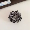 Goma de pelo rizada vintage con estampado de leopardo, alto atractivo estético, versátil para coletas bajas y peinados de moño, accesorio para el cabello