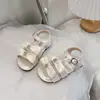 Sandalias de Niña Estilo Coreano 2026 Verano Nuevo Suela Suave Estilo Princesa Moño Pedrería Niña Pequeña Versátil Zapatos de Bebé