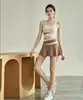 Traje transfronterizo Bloque de color para mujer para correr, fitness, transpirable, secado rápido, bolsillo lateral, anti-rozaduras, falso de dos piezas, shorts de yoga