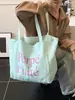 Bolsa de Tote Casual de Nylon Estilo Coreano Moda Ins Estampado de Letras Bolso de Mano Bolso de Hombro Rayado de Doble Cara Celebridad de Internet para Mujer