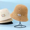 Venta al por mayor de fábrica sombrero de pescador de punto hueco de primavera y verano para mujer mostrar cara pequeño moda sombrero de cubo para el sol sombrero de protección solar transfronterizo