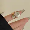 Anillo Hueco Multicapa con Hojas de Ginkgo Vintage Estilo Francés Chapado en Cobre con Oro y Plata Reales Microincrustado con Circonita Versátil Anillo de Hoja Ins