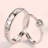 Explosiones al por mayor Plata Chapada Coreano Abierto Anillo de Pareja Coche Flor Corazón Hueco en Forma de Vivo Anillo para Hombres y Mujeres
