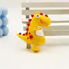 Chaveiro Pingente de Figurine de Dinossauro Desenho Animado em Borracha Macia PVC Ornamento Acessório Clássico Dinossauro Tiranossauro Rex