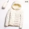 Precio al por mayor 2023 Invierno nuevo chaqueta de plumón ligera para mujer abrigo corto con capucha ultraligero ultrafino ligero moda tendencia