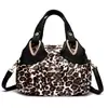 Bolsa de mão feminina estilo chinês 2026 nova coleção primavera/verão, bolsa de mão para mulheres de meia-idade, bolsa tote color-block, bolsa de couro estampada para passeios