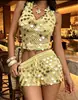 Conjunto de Falda Corta de Lentejuelas Estilo Vacacional Sexy Europeo y Americano 2026 con Top Halter de Ganchillo Atuendo de Vacaciones de Verano