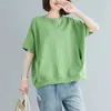 Camiseta de manga corta para mujer de talla grande que cubre el vientre, corte holgado, adelgazante y rejuvenecedora, nuevo top versátil de color liso de manga corta de verano 2026