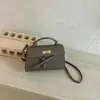 Nova Bolsa Kelly Padrão Lichia para Presente do Festival Qixi Alça de Gravata Borboleta Bolsa Quadrada Pequena de Mão Fivela de Fecho Ombro Único Transversal Bolsa Feminina