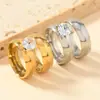 Anel de casal europeu e americano de aço titânio transfronteiriço simples e moderno 6mm bola interna e externa cravação em garra quatro garras joia de aço inoxidável