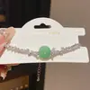 Nuevo Estilo Chino Lujo Ligero Circonita Redonda Imitación de Jade Pulsera Ajustable Moda Personalidad Nicho Temperamento Joyería de Gama Alta para Mujeres