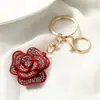 Artículo popular de comercio exterior: Llavero de Metal de Camelia, Lindo Accesorio de Llavero Floral para Coche, Llavero Exquisito de Lujo Ligero