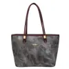 Bolso de Viaje para Mujer 2025 Nuevo Retro Transfronterizo Bolso de Mujer Bolso de Hombro Retro de Mezclilla Bolso Tote Versátil de Alta Gama