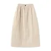 Falda acolchada gruesa de color liso retro japonesa casual coreana para mujer, nueva, versátil, ajustada, de vuelo, para otoño e invierno