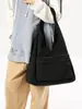 Bolsa de tela estilo coreano transfronteriza para mujer 2025 Nueva de gran capacidad, ligera, para axila/hombro, bolso de mano simple y casual
