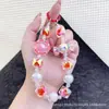 Bolsa de Moda Romántica de Gatito de Caramelo Colorido Llavero Colgante Super Hada Cristal Lanyard para Teléfono Colgante de Perlas