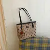 Bolsa Tote de Bolinhas de Alto Estilo Nova Outono 2026 Transfronteiriça, Grande Capacidade, Bolsa de Mão/Ombro Versátil e Moderna para o Dia a Dia