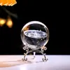 Venta al por mayor transfronteriza esfera de cristal con rueda de la fortuna tallada en 3D en el interior con base metálica creativa, esfera de cristal de galaxia, venta directa de fábrica de comercio exterior