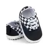 Comercio exterior nueva tendencia zapatos casuales de lona zapatos de bebé suela suave antideslizantes zapatos para niños pequeños zapatos de bebé al por mayor 0938