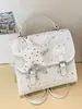Mochila de mujer con estampado de estrellas transfronteriza 2026 nueva moda moderna bolso de mano versátil mochila mini para estudiante de viaje