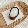 Corea del Sur Ácido Acético Elegante Simple Etiqueta Dorada Anillo para el Cabello Geométrico Curvado Cuerda para el Cabello Cola de Caballo Accesorios para el Cabello para Niña Retro de Alta Gama