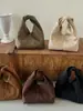 Bolsa de Mão Plissada Grande Capacidade Estilo Francês em Camurça Nova Moda Versátil Outono 2026 Transfronteiriça para Mulheres