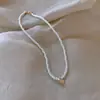 Collar de amor con hueco de cuentas simple, colgante de moda de lujo ligero, cadena para clavícula desmontable, elegante cadena para clavícula de perla sintética