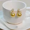 Brincos de Tarraxa de Pérola Flor Trevo de Quatro Folhas Atmosféricos da Moda Socialite Luxo Leve Brilhantes Cheios de Diamante Acessórios de Brinco de Alto Padrão Venda por Atacado