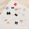 Jóias de unha de arco explosivo resina tridimensional pequeno arco diy decoração de unhas acessórios Joker atacado