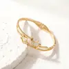 Nueva oferta especial: Pulsera de cable de acero de titanio de moda popular europea y americana, de alta calidad, que conserva el color, versátil, para hombres y mujeres