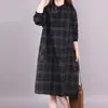 Colección de otoño 2026: nuevo vestido midi a cuadros de estilo coreano, corte holgado, con cuello, bolsillos y mangas largas, diseñado como un vestido camisero para mujer
