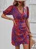 Moda femenina europea y americana transfronteriza de Amazon nuevo elegante para ir al trabajo sexy escote en V manga media entallado a la cintura elegante vestido estampado