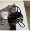 Bolsa Almofada para Mulheres 2026 Nova Super Popular Bolsa de Mão Pequena Bolsa Tote Bolsa de Ombro Único Transversal Doce Laço Pequena Bolsa