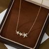 Elegante collar de estrella de mar con diseño de nicho para mujer, cadena de clavícula con microincrustaciones de circonitas galvanizadas en oro auténtico, exquisito collar combinable a la moda.