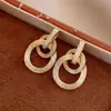 Brincos de Círculo Dourados de Camada Dupla Luxo Acessível High-End Elegante Nicho Brincos Franceses 2025 Novos Brincos Populares para Mulheres