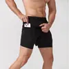 Pantalones cortos transpirables para entrenamiento de comercio exterior transfronterizo para hombres y mujeres, con forro anti-exposición, diseño de dos piezas falsas, adecuados para correr y deportes al aire libre