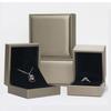 Caja de embalaje de joyería de alta calidad de cuero PU cepillado con oro, caja de almacenamiento para anillos, collares y colgantes, una generación de cabello
