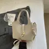 Bolso cubo de canasta de verduras de moda y elegante 2026 Nuevo Llegada de Verano Bolso de Hombro Cruzado Individual de Color Sólido con Textura de Lichi de Nicho
