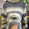 Cardigan de Punto de Manga Larga con Cuello Redondo a Rayas Beige Estilo Coreano Perezoso para Mujer Otoño Nueva Llegada Top Exterior Holgado Versátil