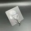 Gancho de acero inoxidable sin perforación gancho fuerte pegajoso pasta sin costuras gancho transparente cocina baño gancho pegajoso sin costuras al por mayor