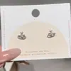 Pendientes Pequeños de Aro con Estrella de Cuatro Puntas para Mujer, Pendientes de Estrella de Zirconia Mini Super Brillantes de Nicho Simple, Nuevo Estilo Soñador