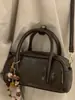 Bolsa Pequena Retro Simples Estilo Coreano Nicho para Mulheres Nova Moda Primavera 2026 Bolsa Transversal Casual Bolsa Almofada de Mão