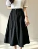 Falda midi de trabajo estilo europeo y americano para mujer, primavera y otoño, talla grande, de cintura alta, que cubre la cadera, adelgazante, línea A, falda de paraguas, exportación