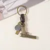 Chaveiro criativo masculino e feminino pequeno presente liga de zinco liga de zinco fofa animal couro trançado vintage chaveiro chaveiro