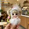 Nuevo llavero de muñeca de maquillaje con temática de fresa de la fábrica original, con un diseño lindo, cordón de silicona colorido y ojos grandes, perfecto como regalo para niñas