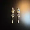 Aretes 2025 Trendy Retro Industria Pesada Estilo Étnico Aretes Versátiles para Mujeres Lujo Accesible Elegantes Largos Clips para Orejas sin Perforación para Mujeres